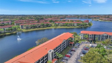 Spacious Magnolia corner unit with a lake view at Century on Flamingo Lakes Country Club in Florida - for sale on GolfHomes.com, golf home, golf lot