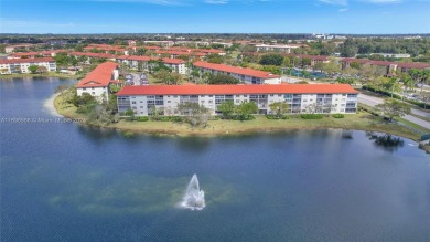 Spacious Magnolia corner unit with a lake view at Century on Flamingo Lakes Country Club in Florida - for sale on GolfHomes.com, golf home, golf lot