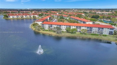 Spacious Magnolia corner unit with a lake view at Century on Flamingo Lakes Country Club in Florida - for sale on GolfHomes.com, golf home, golf lot