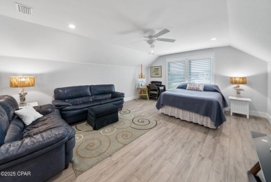 CUSTOM LAKE FRONT HOME WITH PRIVATE DOCK, BOATHOUSE FEATURING 6K on Sharks Tooth Golf Club in Florida - for sale on GolfHomes.com, golf home, golf lot