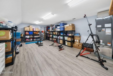 CUSTOM LAKE FRONT HOME WITH PRIVATE DOCK, BOATHOUSE FEATURING 6K on Sharks Tooth Golf Club in Florida - for sale on GolfHomes.com, golf home, golf lot