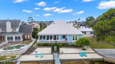 CUSTOM LAKE FRONT HOME WITH PRIVATE DOCK, BOATHOUSE FEATURING 6K on Sharks Tooth Golf Club in Florida - for sale on GolfHomes.com, golf home, golf lot