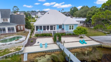 CUSTOM LAKE FRONT HOME WITH PRIVATE DOCK, BOATHOUSE FEATURING 6K on Sharks Tooth Golf Club in Florida - for sale on GolfHomes.com, golf home, golf lot