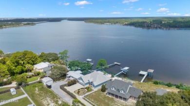 CUSTOM LAKE FRONT HOME WITH PRIVATE DOCK, BOATHOUSE FEATURING 6K on Sharks Tooth Golf Club in Florida - for sale on GolfHomes.com, golf home, golf lot