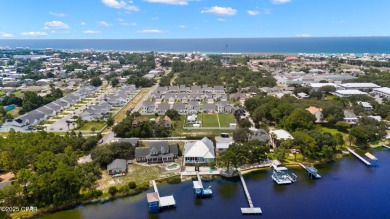 CUSTOM LAKE FRONT HOME WITH PRIVATE DOCK, BOATHOUSE FEATURING 6K on Sharks Tooth Golf Club in Florida - for sale on GolfHomes.com, golf home, golf lot