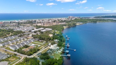 CUSTOM LAKE FRONT HOME WITH PRIVATE DOCK, BOATHOUSE FEATURING 6K on Sharks Tooth Golf Club in Florida - for sale on GolfHomes.com, golf home, golf lot