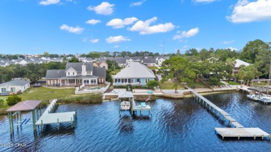 CUSTOM LAKE FRONT HOME WITH PRIVATE DOCK, BOATHOUSE FEATURING 6K on Sharks Tooth Golf Club in Florida - for sale on GolfHomes.com, golf home, golf lot