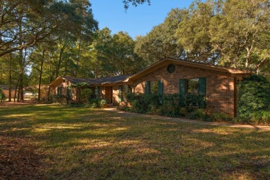 UPDATED GOLF COURSE HOME WITH BONUS BUILDING! This isn't your on Rocky Bayou Country Club in Florida - for sale on GolfHomes.com, golf home, golf lot