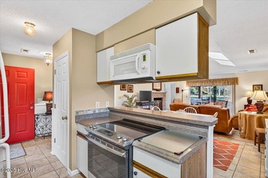 Discover this pristine 3-bedroom, 2-bath home located in the on Sea Trail Golf Resort in North Carolina - for sale on GolfHomes.com, golf home, golf lot