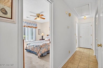 Discover this pristine 3-bedroom, 2-bath home located in the on Sea Trail Golf Resort in North Carolina - for sale on GolfHomes.com, golf home, golf lot