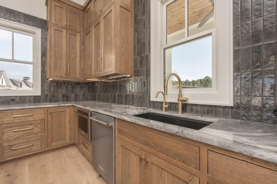 Beautiful new construction in the heart of Richland Pointe on Reynolds Lake Oconee - The Oconee in Georgia - for sale on GolfHomes.com, golf home, golf lot