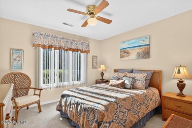 Discover this pristine 3-bedroom, 2-bath home located in the on Sea Trail Golf Resort in North Carolina - for sale on GolfHomes.com, golf home, golf lot
