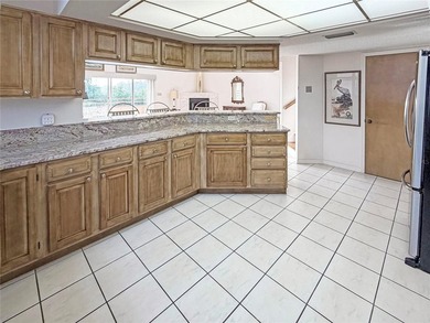 Nestled in the calm, serene, private gated-community of Royal on Pasadena Yacht and Country Club in Florida - for sale on GolfHomes.com, golf home, golf lot