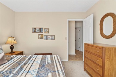 Discover this pristine 3-bedroom, 2-bath home located in the on Sea Trail Golf Resort in North Carolina - for sale on GolfHomes.com, golf home, golf lot