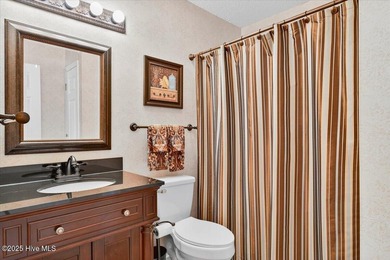 Discover this pristine 3-bedroom, 2-bath home located in the on Sea Trail Golf Resort in North Carolina - for sale on GolfHomes.com, golf home, golf lot