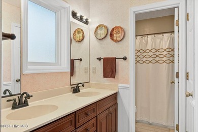 Discover this pristine 3-bedroom, 2-bath home located in the on Sea Trail Golf Resort in North Carolina - for sale on GolfHomes.com, golf home, golf lot