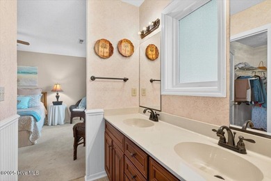 Discover this pristine 3-bedroom, 2-bath home located in the on Sea Trail Golf Resort in North Carolina - for sale on GolfHomes.com, golf home, golf lot