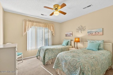 Discover this pristine 3-bedroom, 2-bath home located in the on Sea Trail Golf Resort in North Carolina - for sale on GolfHomes.com, golf home, golf lot