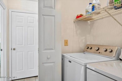 Discover this pristine 3-bedroom, 2-bath home located in the on Sea Trail Golf Resort in North Carolina - for sale on GolfHomes.com, golf home, golf lot