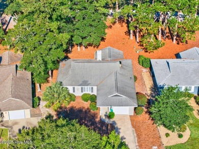 Discover this pristine 3-bedroom, 2-bath home located in the on Sea Trail Golf Resort in North Carolina - for sale on GolfHomes.com, golf home, golf lot