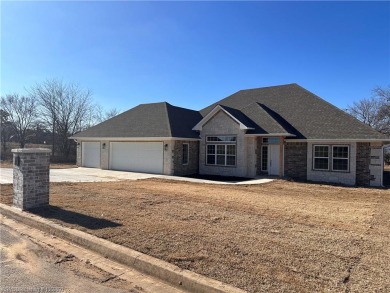 Welcome to the newly constructed 33901 El Dorado Court, Wister on Wolf Ridge Golf Course in Oklahoma - for sale on GolfHomes.com, golf home, golf lot