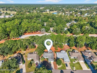 Discover this pristine 3-bedroom, 2-bath home located in the on Sea Trail Golf Resort in North Carolina - for sale on GolfHomes.com, golf home, golf lot