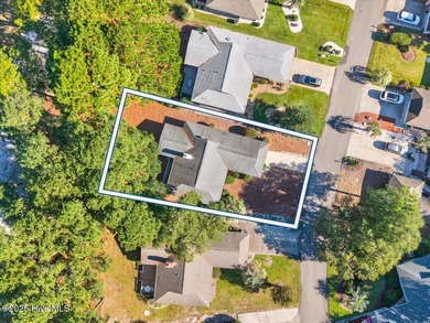 Discover this pristine 3-bedroom, 2-bath home located in the on Sea Trail Golf Resort in North Carolina - for sale on GolfHomes.com, golf home, golf lot