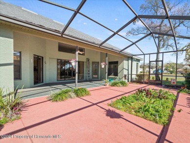 Situated on a large .34 corner lot, this beautifully landscaped on Glen Lakes Country Club in Florida - for sale on GolfHomes.com, golf home, golf lot