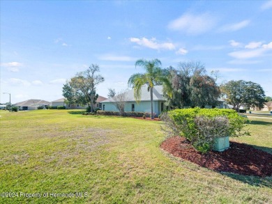 Situated on a large .34 corner lot, this beautifully landscaped on Glen Lakes Country Club in Florida - for sale on GolfHomes.com, golf home, golf lot