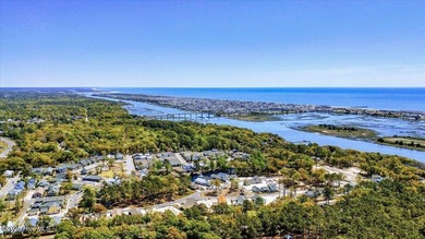 Discover this pristine 3-bedroom, 2-bath home located in the on Sea Trail Golf Resort in North Carolina - for sale on GolfHomes.com, golf home, golf lot