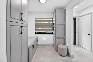 See this beautifully renovated, lake-front townhome superbly on Boca Delray Golf and Country Club in Florida - for sale on GolfHomes.com, golf home, golf lot