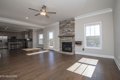 Mountain and golf course view home in The Preserve, a lake-front on The Preserve 9 Hole Golf Course in Tennessee - for sale on GolfHomes.com, golf home, golf lot