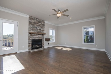 Mountain and golf course view home in The Preserve, a lake-front on The Preserve 9 Hole Golf Course in Tennessee - for sale on GolfHomes.com, golf home, golf lot