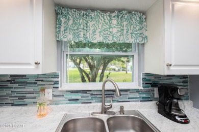 Turnkey Home in Pine Island - This meticulously maintained on New Smyrna Beach Golf Course in Florida - for sale on GolfHomes.com, golf home, golf lot
