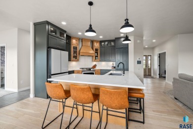 Experience luxury living in this beautiful two-story walkout on Willow Run Golf Course in South Dakota - for sale on GolfHomes.com, golf home, golf lot