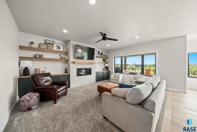 Experience luxury living in this beautiful two-story walkout on Willow Run Golf Course in South Dakota - for sale on GolfHomes.com, golf home, golf lot
