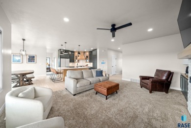 Experience luxury living in this beautiful two-story walkout on Willow Run Golf Course in South Dakota - for sale on GolfHomes.com, golf home, golf lot
