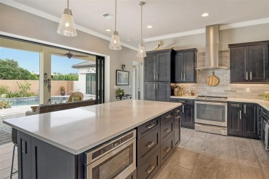 This custom-built island home represents Florida living at its on Lake Venice Golf Club in Florida - for sale on GolfHomes.com, golf home, golf lot