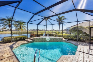 Under contract-accepting backup offers. This MAGNIFICENT home is on Pelican Pointe Golf and Country Club in Florida - for sale on GolfHomes.com, golf home, golf lot