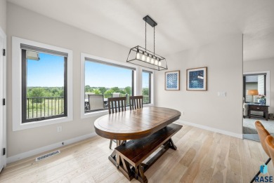 Experience luxury living in this beautiful two-story walkout on Willow Run Golf Course in South Dakota - for sale on GolfHomes.com, golf home, golf lot