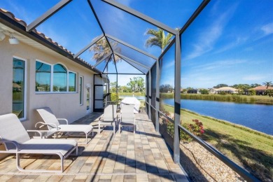 Under contract-accepting backup offers. This MAGNIFICENT home is on Pelican Pointe Golf and Country Club in Florida - for sale on GolfHomes.com, golf home, golf lot