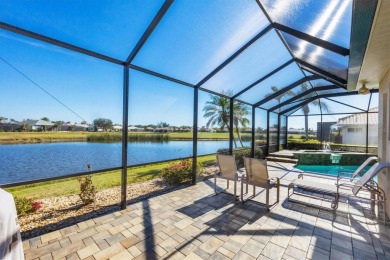 Under contract-accepting backup offers. This MAGNIFICENT home is on Pelican Pointe Golf and Country Club in Florida - for sale on GolfHomes.com, golf home, golf lot