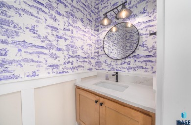 Experience luxury living in this beautiful two-story walkout on Willow Run Golf Course in South Dakota - for sale on GolfHomes.com, golf home, golf lot