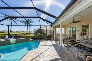 Under contract-accepting backup offers. This MAGNIFICENT home is on Pelican Pointe Golf and Country Club in Florida - for sale on GolfHomes.com, golf home, golf lot