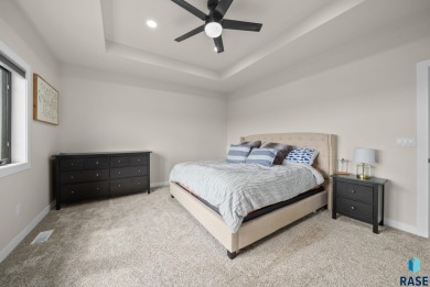 Experience luxury living in this beautiful two-story walkout on Willow Run Golf Course in South Dakota - for sale on GolfHomes.com, golf home, golf lot