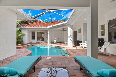 Discover island living at its finest in this elegant 4-bedroom on The Sanctuary Golf Club in Florida - for sale on GolfHomes.com, golf home, golf lot