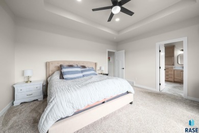 Experience luxury living in this beautiful two-story walkout on Willow Run Golf Course in South Dakota - for sale on GolfHomes.com, golf home, golf lot