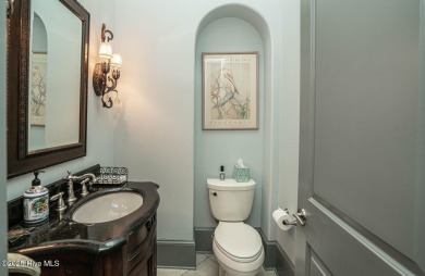 Gorgeous custom home built by award winning Carrell Homes.  This on Ocean Ridge Plantation in North Carolina - for sale on GolfHomes.com, golf home, golf lot