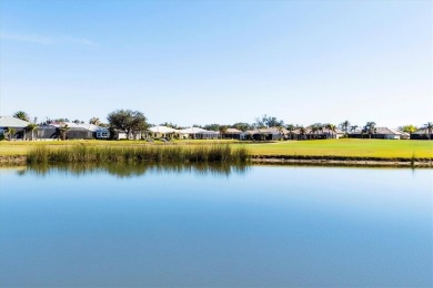 Under contract-accepting backup offers. This MAGNIFICENT home is on Pelican Pointe Golf and Country Club in Florida - for sale on GolfHomes.com, golf home, golf lot