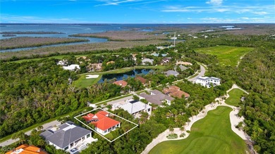 Discover island living at its finest in this elegant 4-bedroom on The Sanctuary Golf Club in Florida - for sale on GolfHomes.com, golf home, golf lot